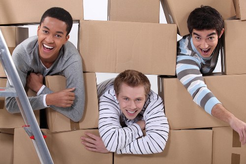 Packing and loading furniture into a van near Strawberry Hill