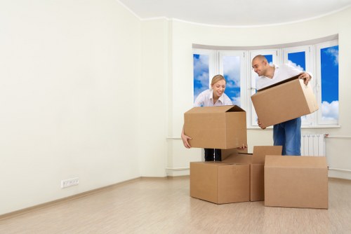 Packed moving boxes and furniture ready for transport in Strawberry Hill