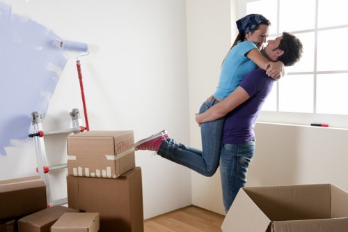 Moving house support in Strawberry Hill with local properties and a removals van