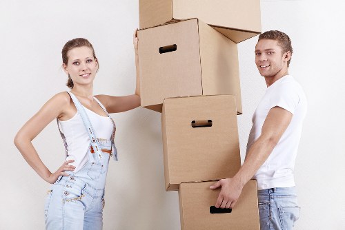 Loading furniture into a moving truck near Strawberry Hill flats