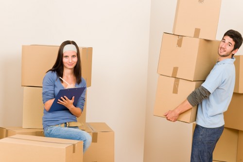 Careful unloading of boxes and furniture at a Strawberry Hill property
